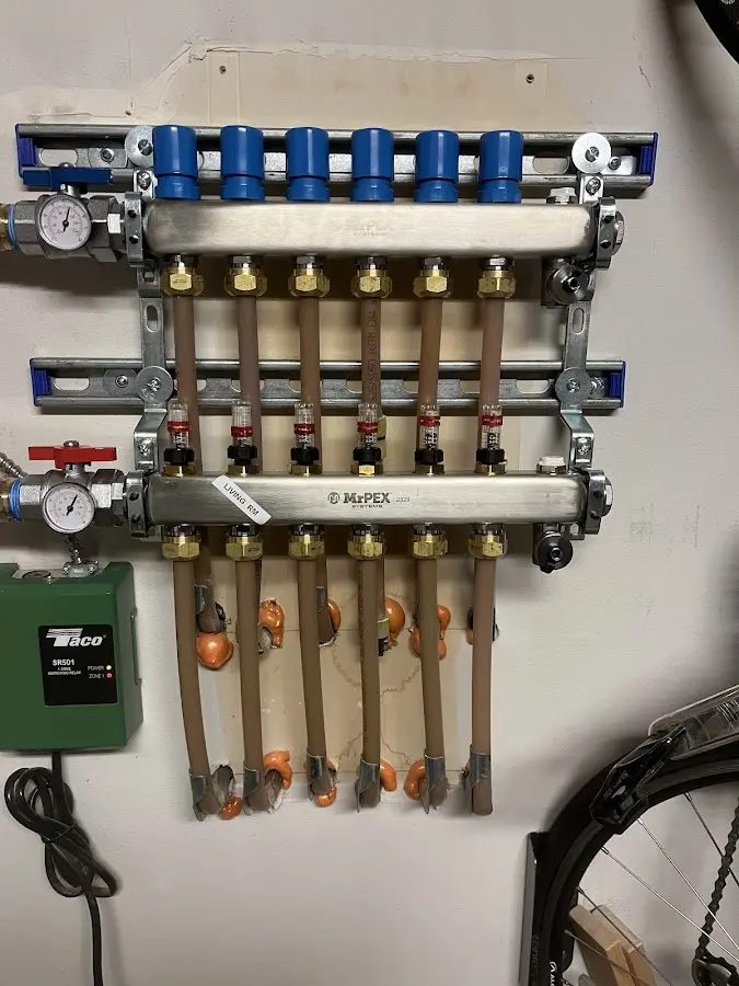 Plumber performing Water Heater Repair at a residential property in Larch Way